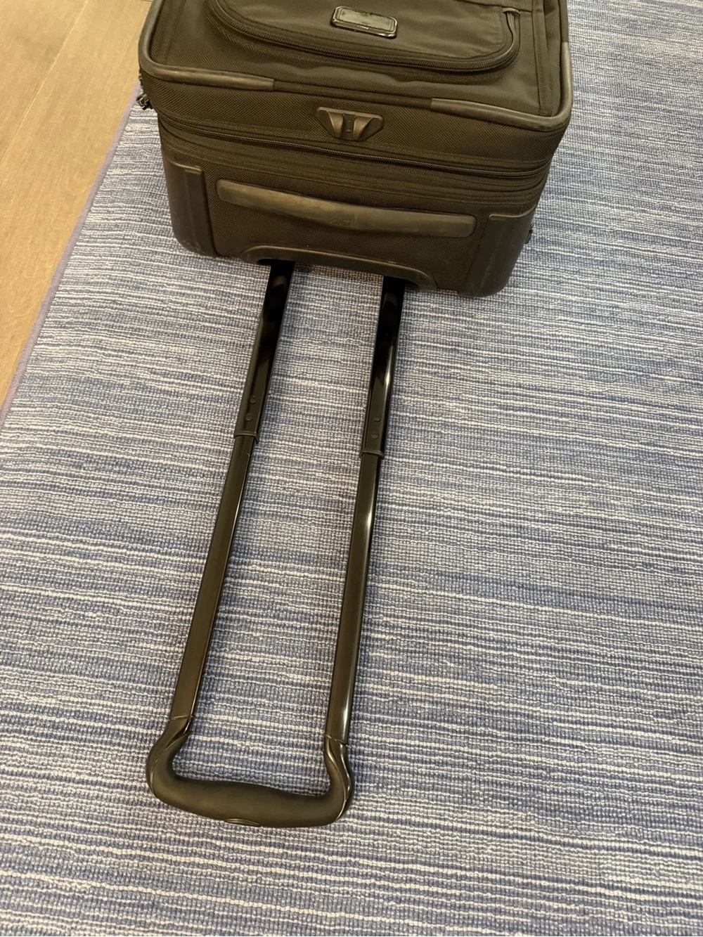 Tumi Black Softside Carry-On with Front Zip Pocket